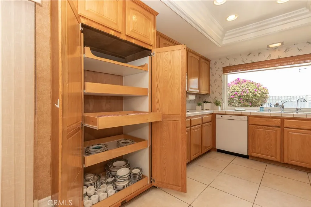 Pull out shelves in the pantry cupboard.