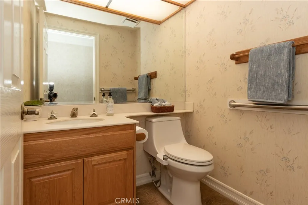 Perfect little powder room right near the family room and kitchen.