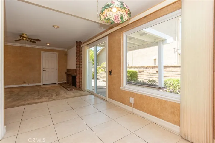 Lovely breakfast area with a view to the side yard and gardens.