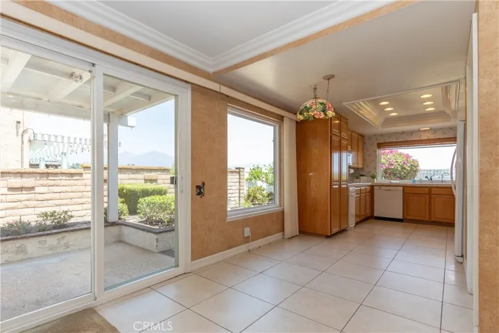 Sliding doors to a covered patio from the breakfast room.