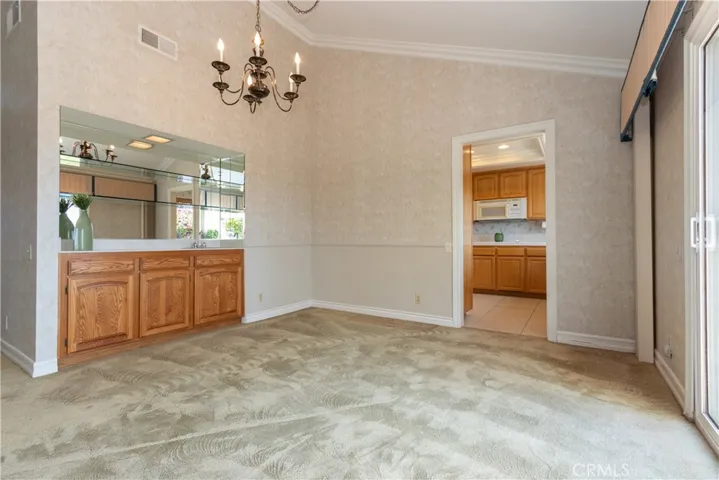 Wet bar and cabinets in the dining room.