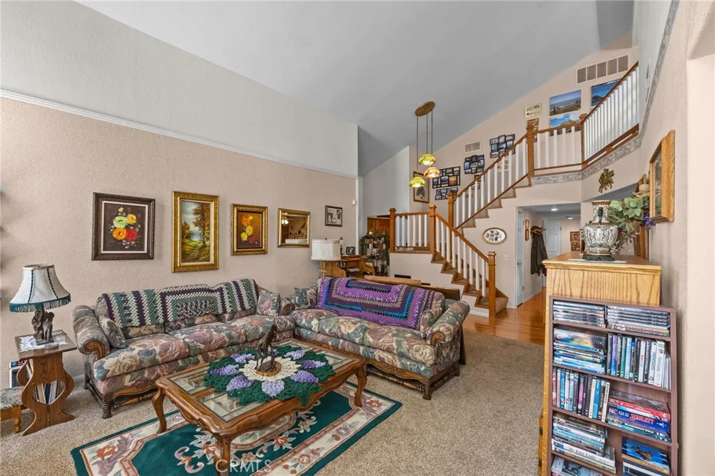 Large living room with a wood-burning fireplace