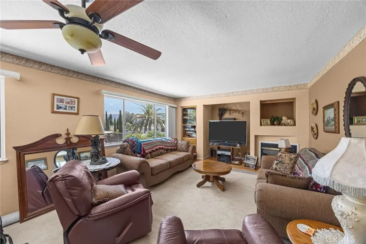 Upstairs multi-gen room with a fireplace