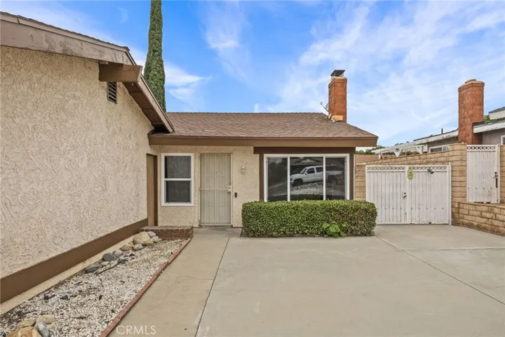 Front door and RV parking area.