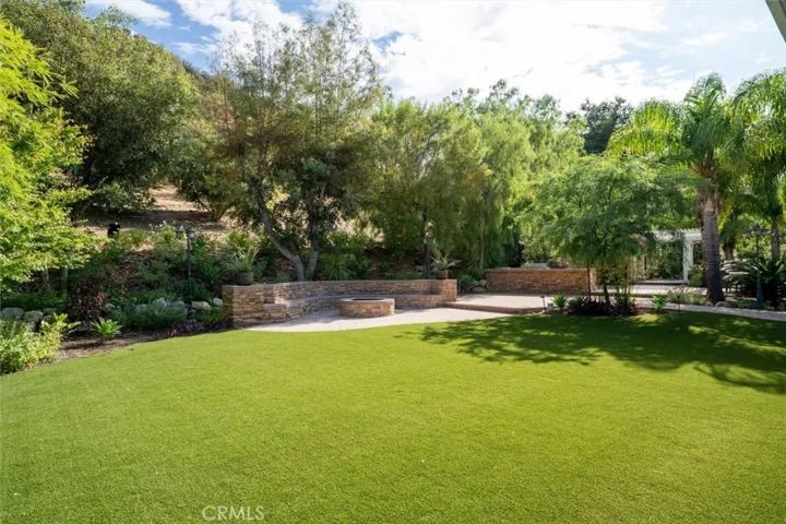 FIRE PIT AND BENCH With LARGE TURF AREA