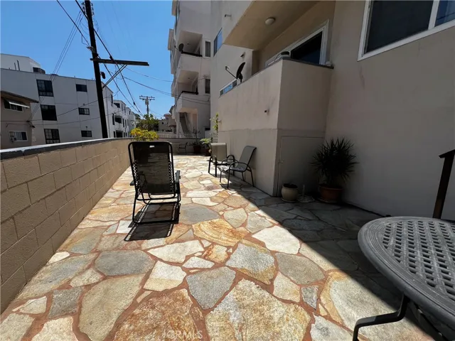 Private community patio in rear of complex