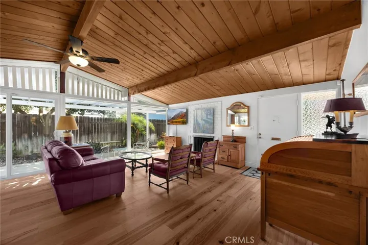 Open living room with floor to ceiling window