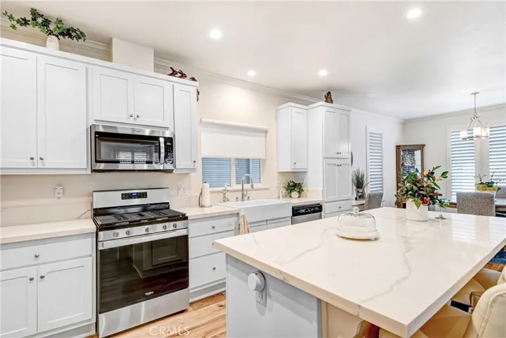 Kitchen and Dining area looking to front of home