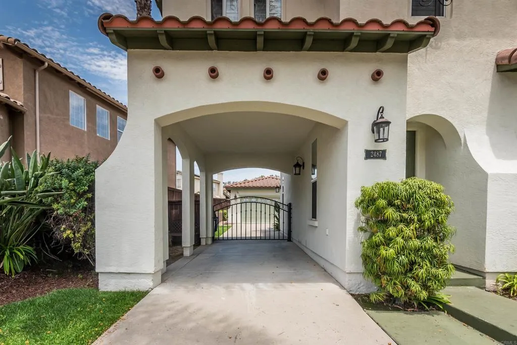 Drive through to Garage or Use as additional covered parking space