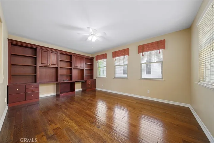 upstairs bonus room with bookcase