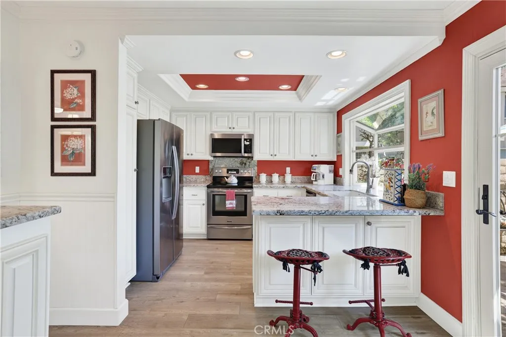 Nice updated Kitchen with bay window and roll out drawers in the cabinets. With views of the yard.