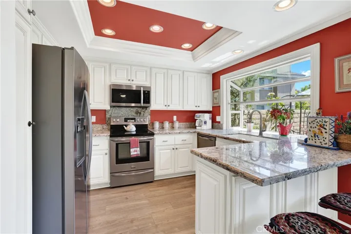 Nice updated Kitchen with bay window and roll out drawers in the cabinets.