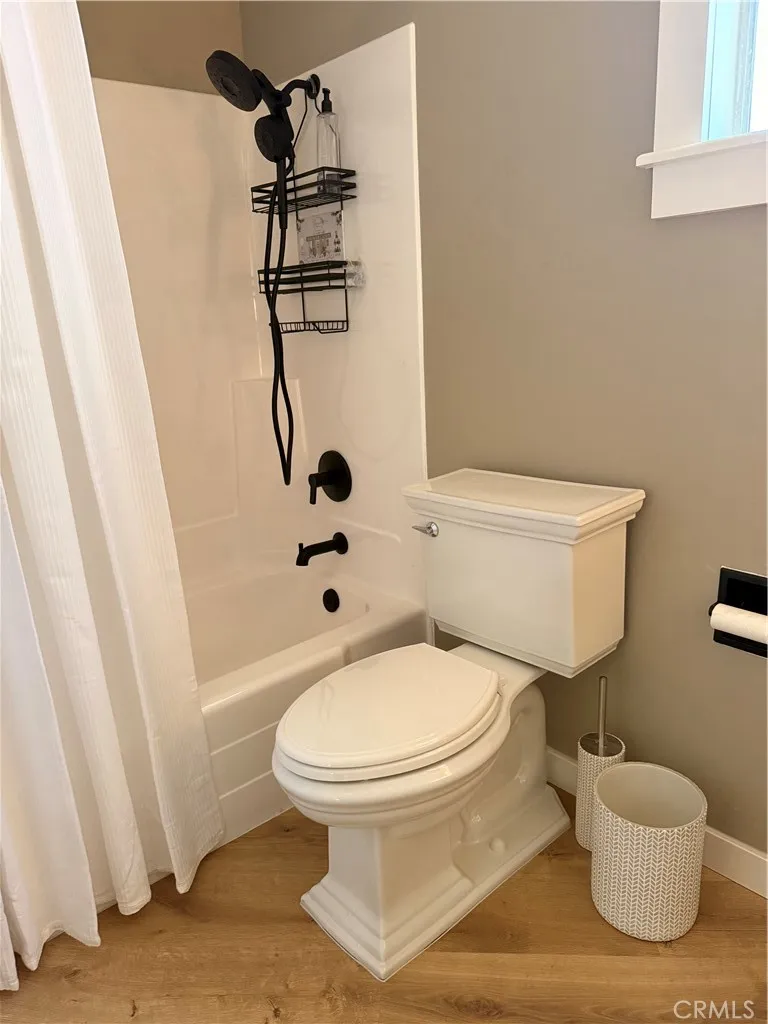 Shower over tub. New Toilet