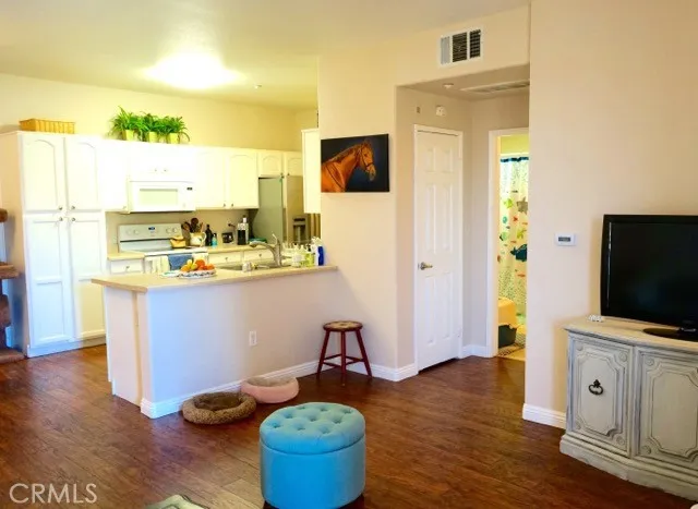 Kitchen and part of Living room with Fireplace