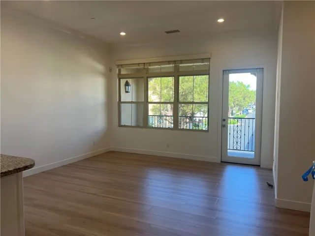 From stairway to view the living room and balcony