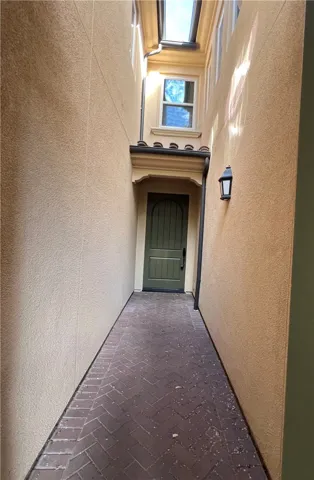  the brick paved corridor behind front gate