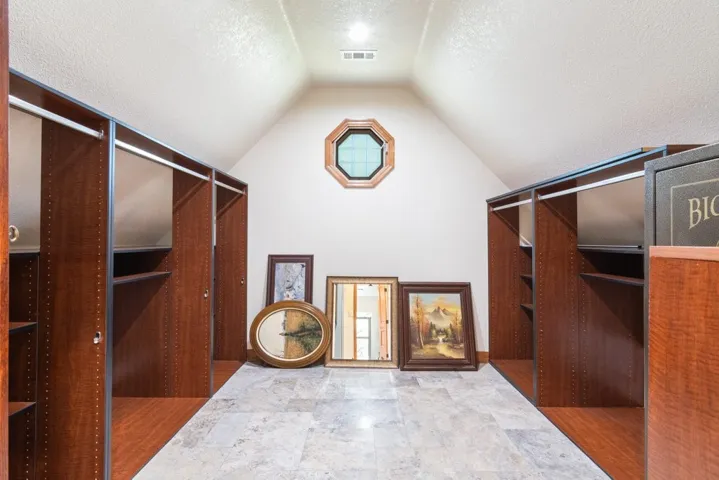 Primary closet with gun safe