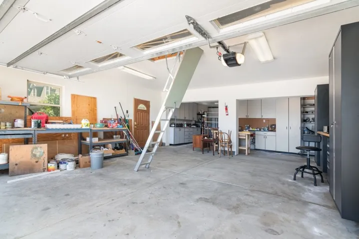 3 car garage and storage room
