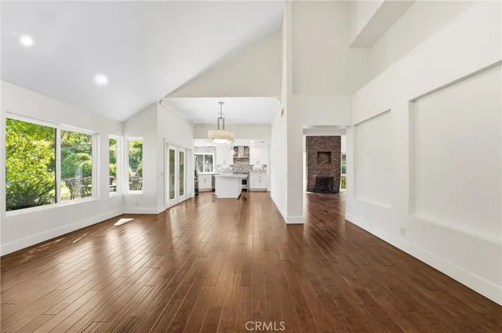 Living room looking towards dining area and kitchen.