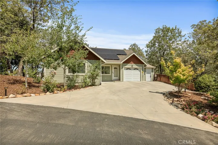 Gorgeous 1-STORY Newer Home with LUSH LANDSCAPING AND PAID OFF SOLAR!!