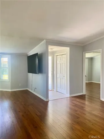 LOOKING FROM THE KITCHEN TOWARDS THE FRONT ENTRY WAY