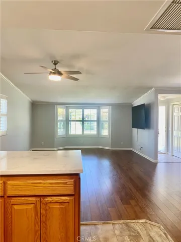 KITCHEN LOOKING TO THE LIVING ROOM