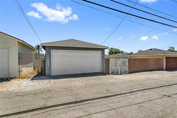 Garage access is through the alley that runs along the rear of the property.