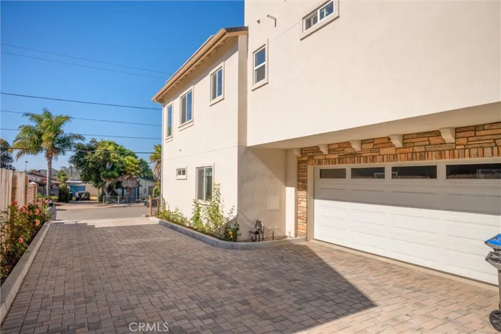 Shared driveway, spacious two car garage