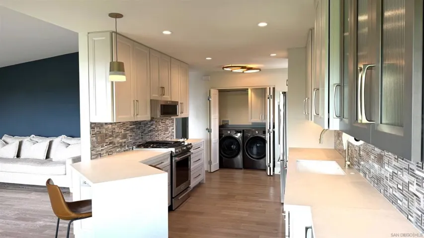 Laundry area at the end with doors open