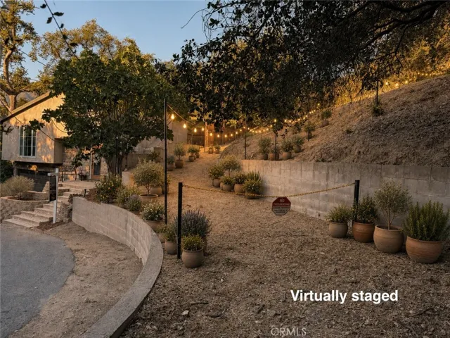 Path up from street to top of property Virtually Staged