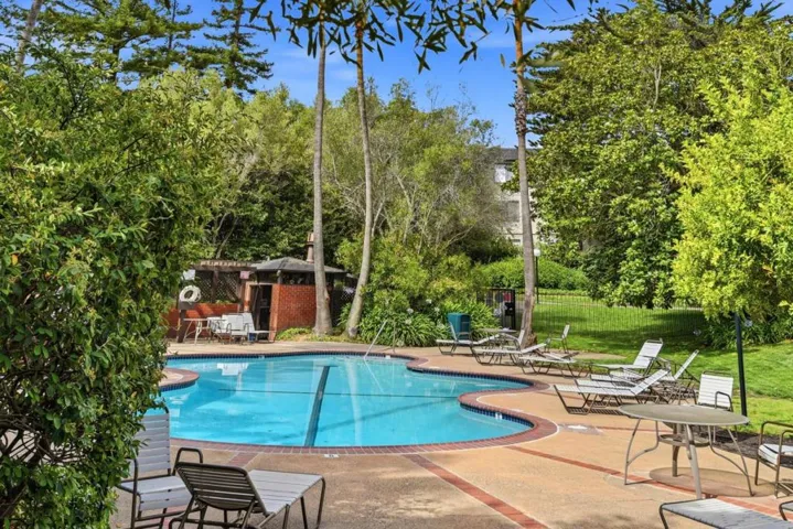 Sparkling community pool just steps from the private patio