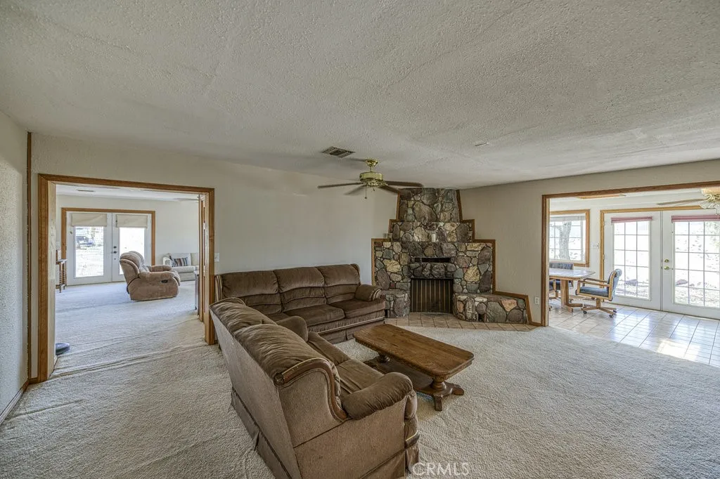 Family Room/Den with Stone Fireplace