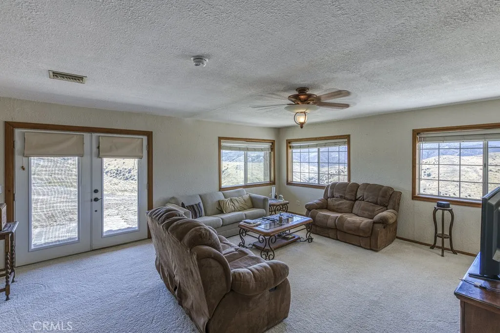 FORMAL LIVING ROOM INCREDIBLE VIEWS FROM EVERY WINDOW