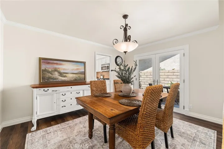 Dining room with back side yard access- bright and beautiful