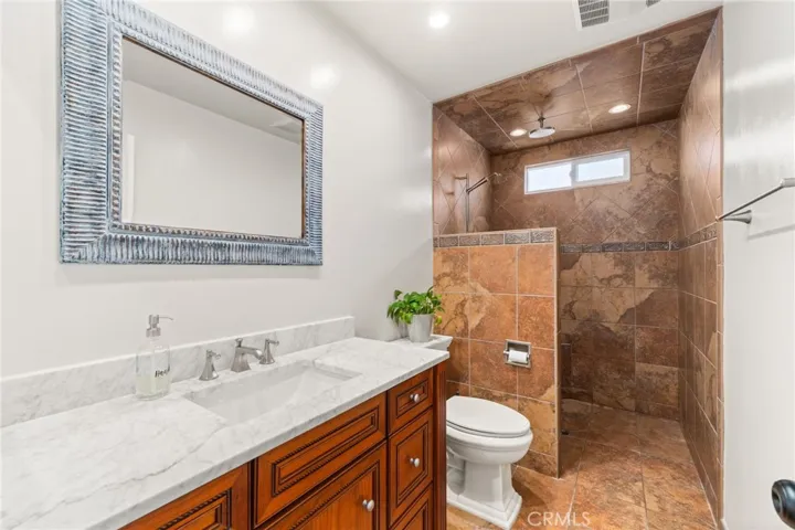 upstairs bathroom with walk in spa like shower