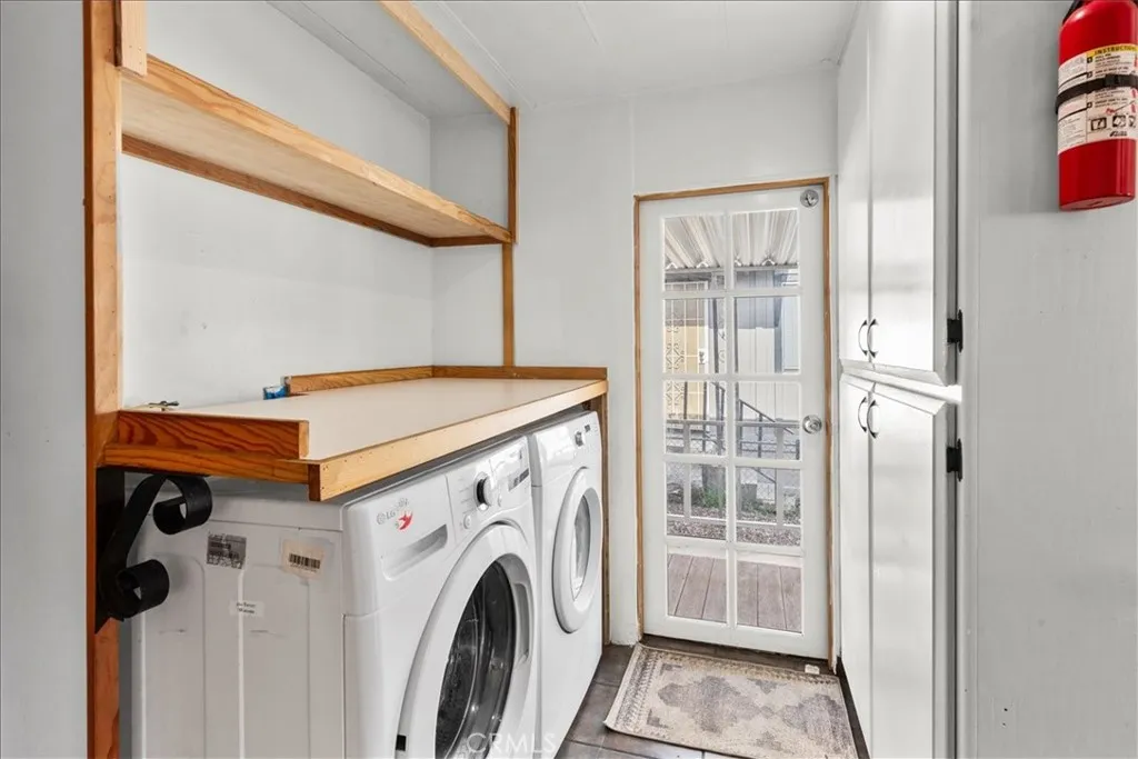 Laundry room with washer and dryer