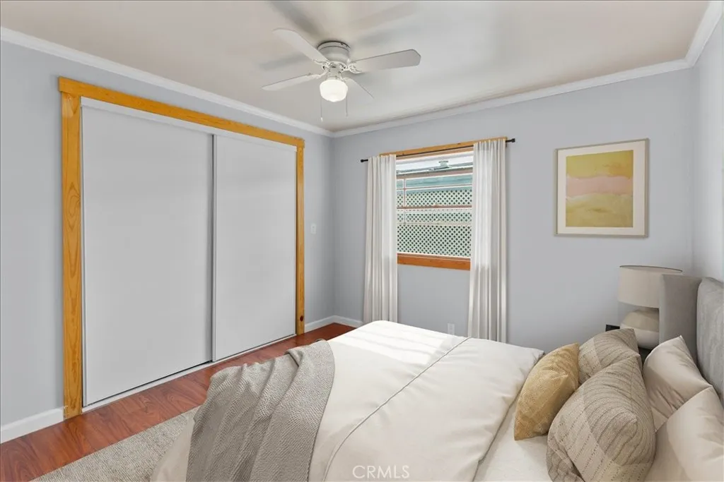 Primary bedroom master bed virtually staged -Master bath included Bedroom with ceiling fan and closet