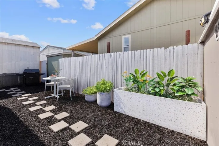 Private patio with fenced yard