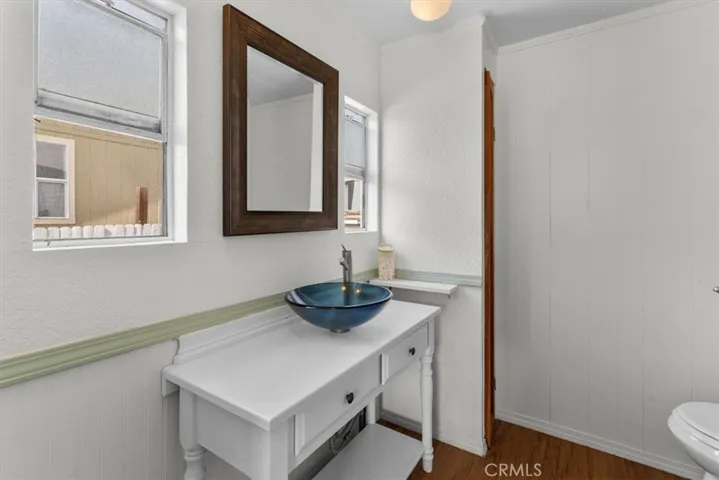 Half bath with vessel sink