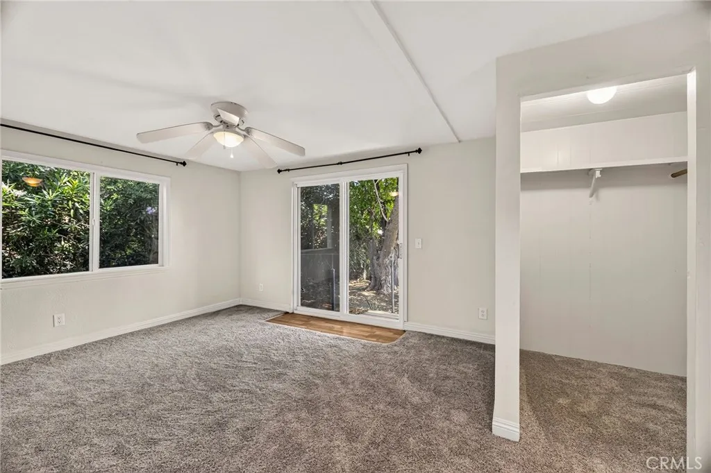 Primary bedroom  with a walk in closet