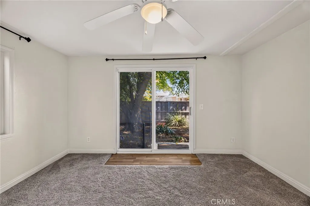 Primary bedroom  with a patio door to the backyard