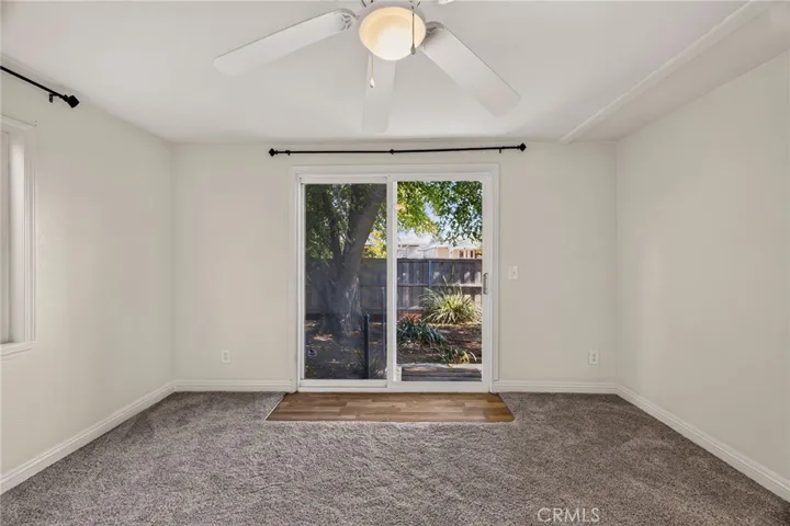 Primary bedroom  with a patio door to the backyard