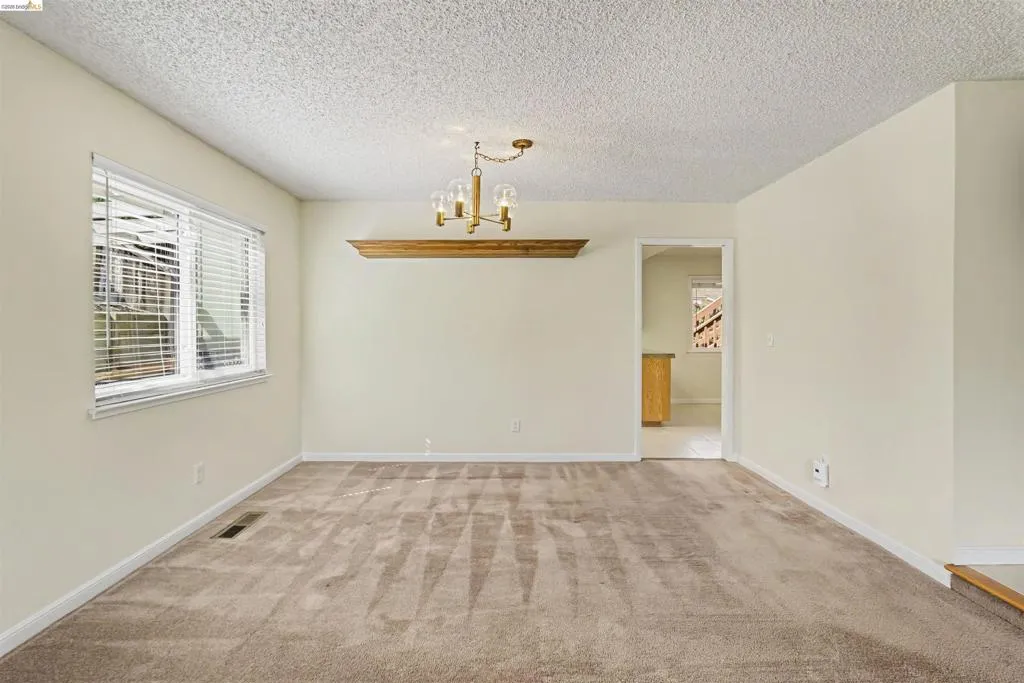 Neutral-toned carpeting throughout