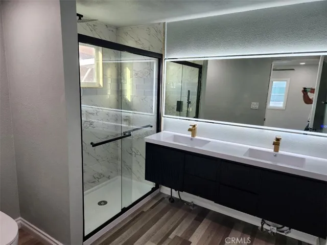 Master Bathroom-w/ double vanities and fogless mirror with built in light and walk in shower