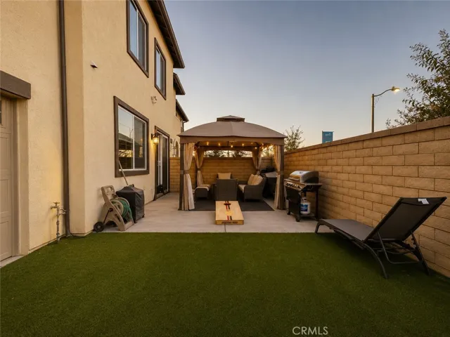 Backyard patio and turf
staged