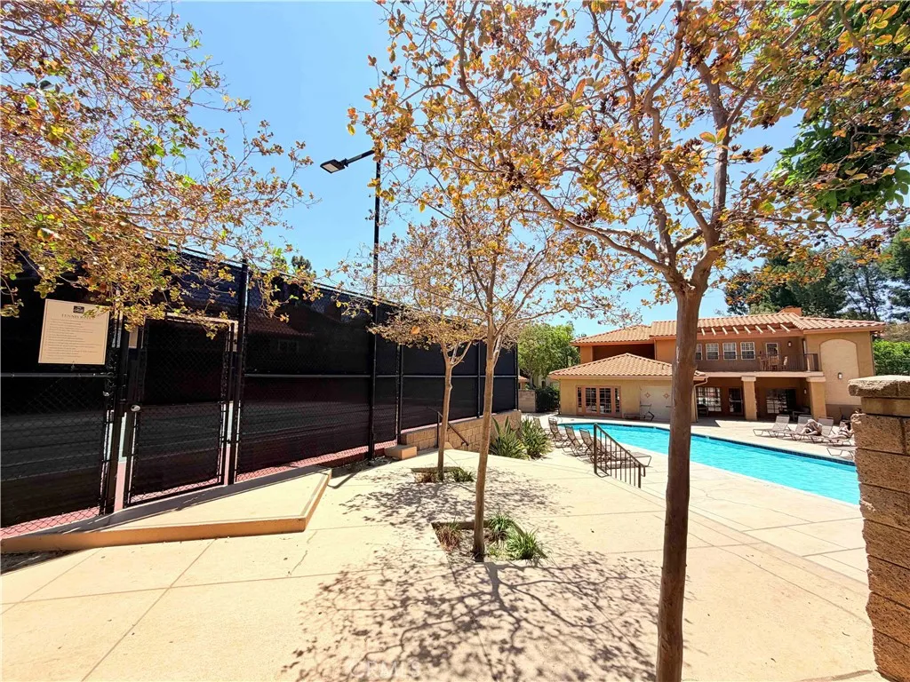 This one of the two pools and tennis court.