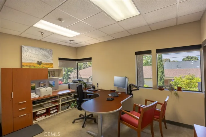 Spacious and private corner office with scenic views and access to balcony