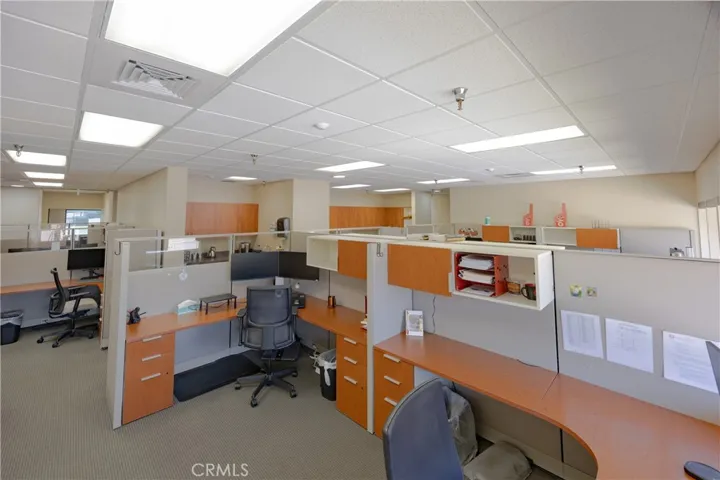 Upper-level workspace featuring abundant natural light.