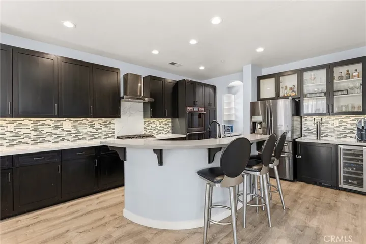 Island faces the family room...see the Kegerator & wine fridge!