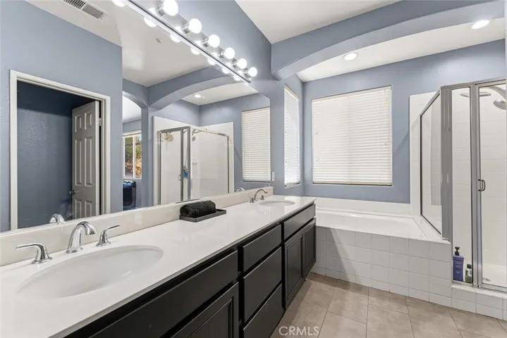 Primary Bath w/ dual sinks, separate tub & shower!